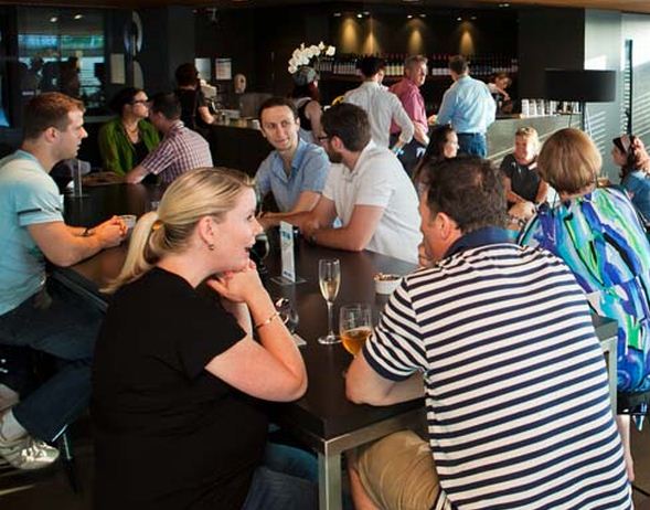 Visitors relaxing at the GOMA Lounge Bar, January, 2012 / Photograph: Brodie Standen